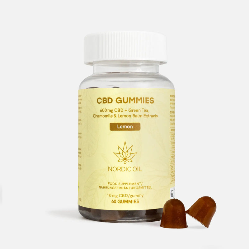 Bottiglia di CBD Gummies al limone di Nordic Oil con due gommini accanto