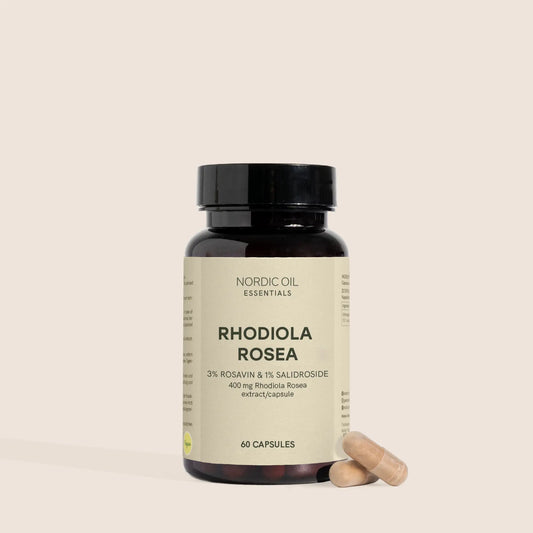Bottiglia di integratore Rhodiola Rosea di Nordic Oil Essentials con capsule accanto