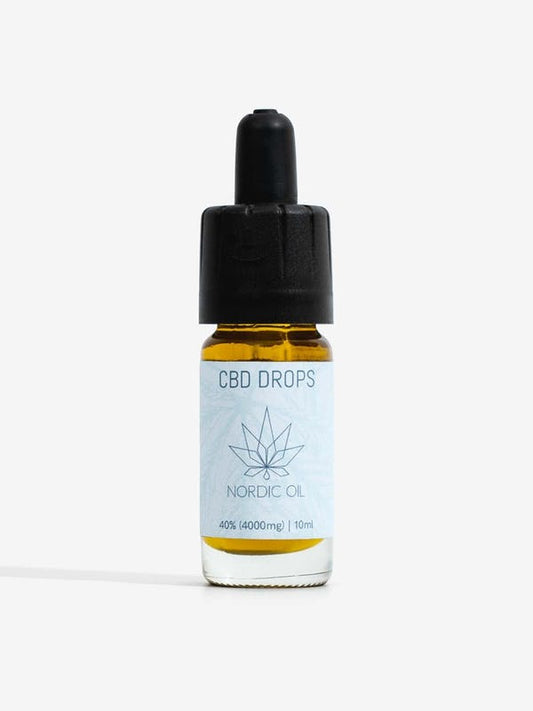 Bottiglia di gocce di CBD Nordic Oil con contagocce e etichetta azzurra.